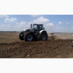 Услуги по обработке земли: вспашка и другие работы по подготовке почвы